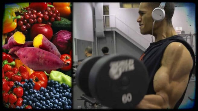Richard Burgess of vegan gains is shown at the gym. He curling his arms, lifting a dumbbell, the massive muscles of his arms taught and distinct. To the left of this image is one of a very colorful selection of fruit and vegetables.