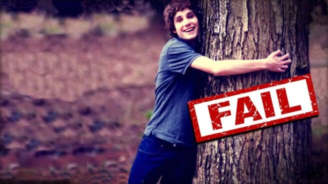 A person with their arms wrapped around a wide tree trunk. The word "FAIL" is stamped in red overtop the image.