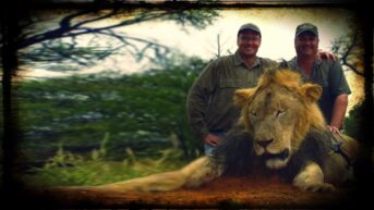 American dentist Walter Palmer is shown with another, pose for a photograph over the poor body of Cecil, a murdered lion.