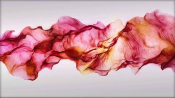 A swirl of translucent pink and yellow silk is shown flowing across the image as if floating.