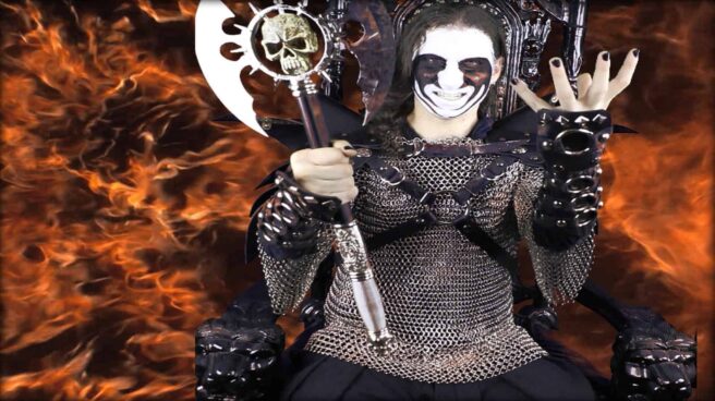 Brian, the Vegan Black Metal Chef, is shown in his full heavy metal regalia.