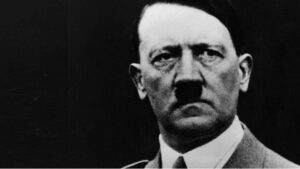 The image shows a close-up of Adolf Hitler.
