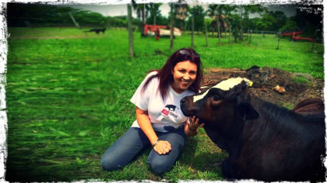 Renee King-Sonnen of Rowdy Girl Sanctuary is shown with Houdini, a beautiful calf.