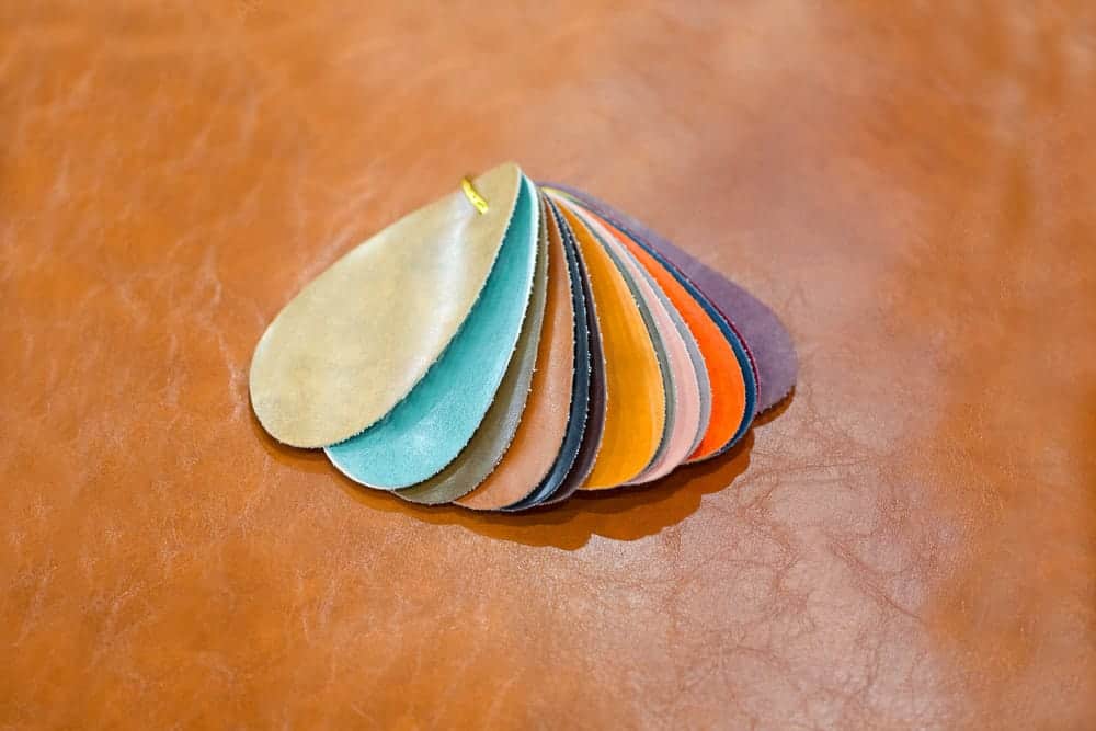 Sample swatches of various colors of polyurethane synthetic leather.
